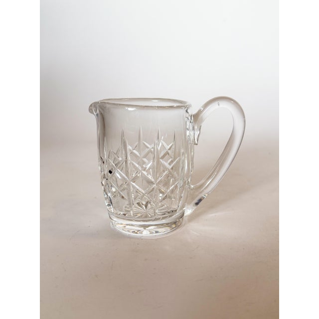 Add a little elegance to your daily routine with this Vintage Waterford Crystal Lismore Creamer Pitcher. The vintage mark...