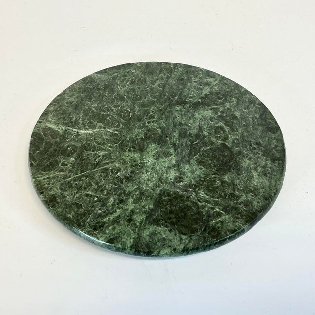 This is an Italian green marble Cheese Tray Serving Piece. The round slab of marble is from the 1970s and in very good...