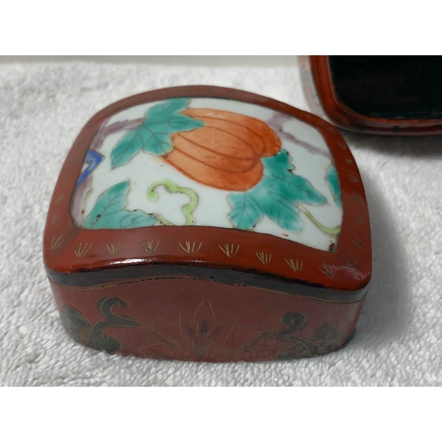 Excellent Antique Pre-Owned Condition. Hand painted and made from lacquered wood with a porcelain inlay top; exterior...