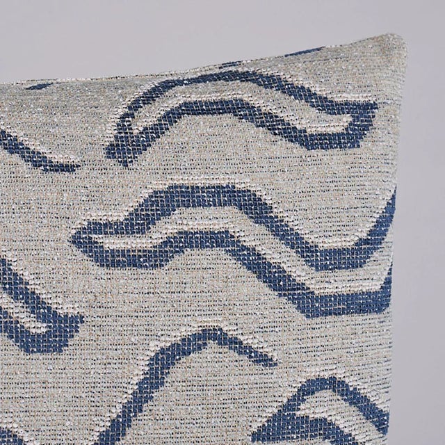 This pillow features Kata with a knife edge finish. An abstract take on a Tibetan tiger pattern, denim-colored Kata is a...
