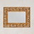 An Italian wall mirror from the 1970s, framed in warm-toned bamboo with an intricate Greek key motif. The rectangular...