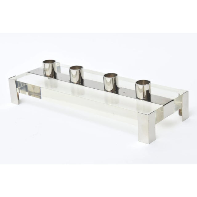 This vintage lucite and chrome rectangular candleholder or candlestick has been professionally polished. From the 70's....