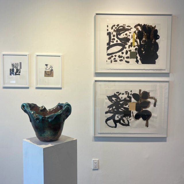 Brown black and tan abstract gestural painting on paper with collaged found paper by Chicago-based artist Deborah Newmark....