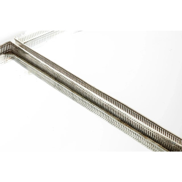 English silver plate gallery frame with mirrored interior three piece surtout -de-table plateau / centerpiece. The piece...