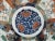 Antique Japanese Imari charger plate. Intricate hand painted flower and landscape medallion design. Measures 18 3/4" x 2...