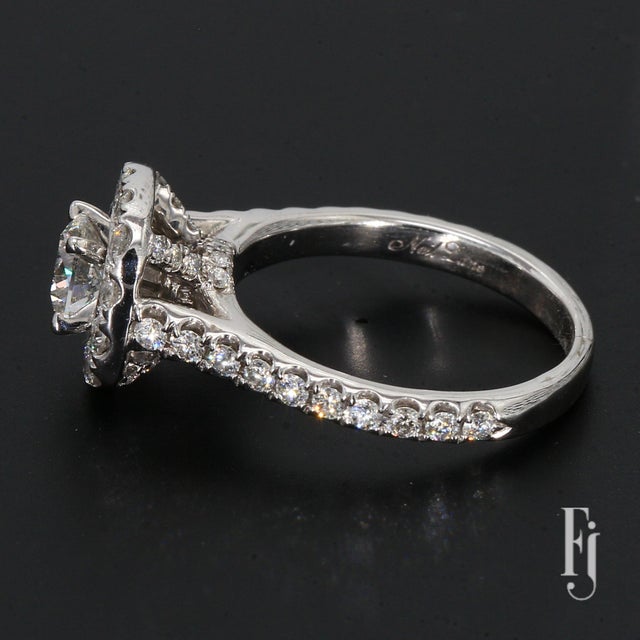 Here is a 14k White Gold Ring with One 5.0ct. G/SI3 Round Diamond Center & Fifty-Two 0.02ct. G/SI3 Accent Diamonds. Ring...