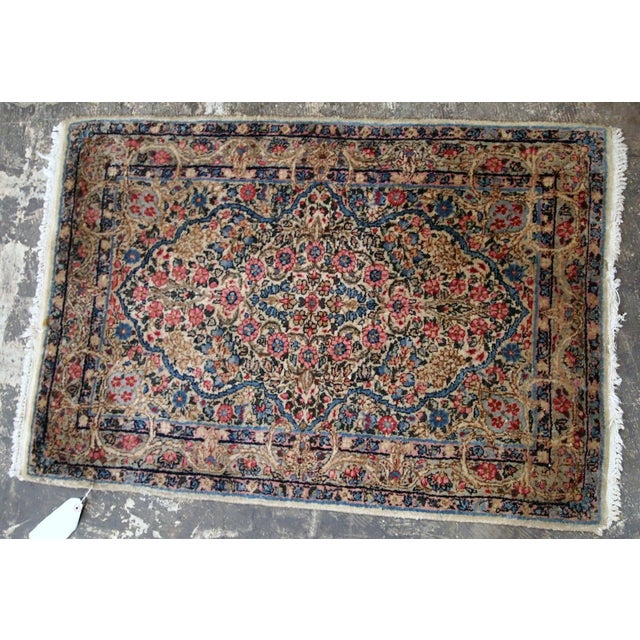 Antique Persian Kerman floral rug in colorful shades. The rug is from the beginning of 20th century in original good...
