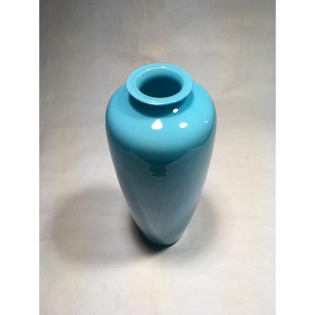 This Post-Modern Murano glass vase has a very elegant and delicate light blue tone. Becouse it’s not industrial...