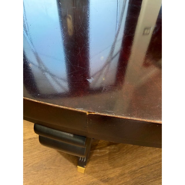Wood Attributed to Hickory Chair Company Flame Mahogany Round Coffee Table With Brass Sabots For Sale - Image 7 of 12