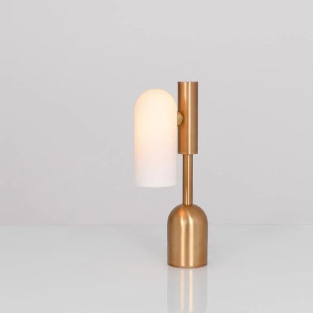 Odyssey 1 brass table lamp by schwung dimensions: w 10 x d 21 x h 44.6 cm materials: brass, frosted glass finishes...