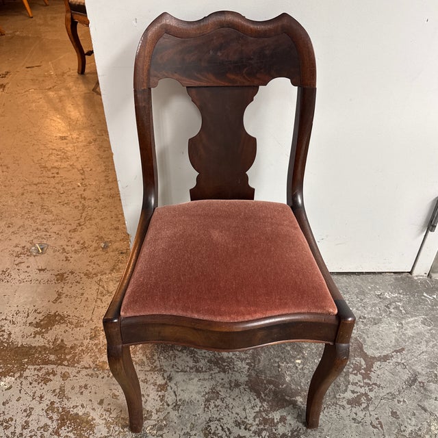 Design Plus Gallery presents a Victorian Flame Mahogany Side Chair The chair displays a traditional Victorian-inspired...