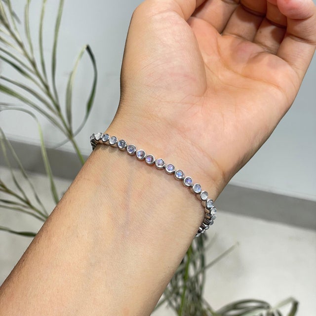 Handmade Round 9.1 Ct Rainbow Moonstone Bezel Set Infinity Line Tennis Bracelet in 925 Silver For Sale - Image 4 of 14