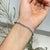 Handmade Round 9.1 Ct Rainbow Moonstone Bezel Set Infinity Line Tennis Bracelet in 925 Silver For Sale - Image 4 of 14