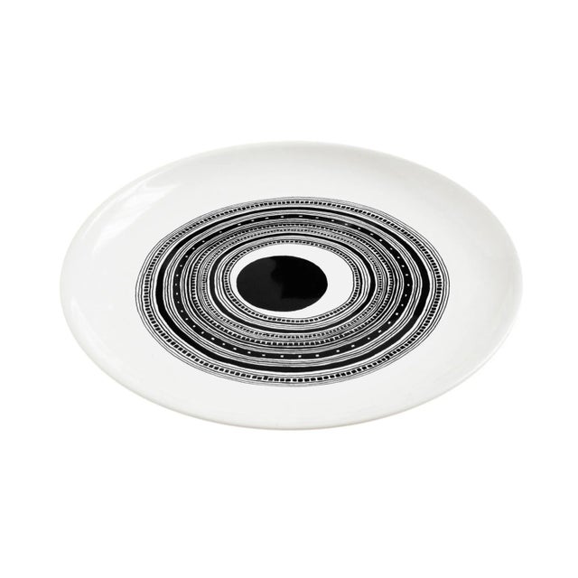 The design of "Pass", consisting of a concentric circumference series, is designed to accommodate the most essential and...