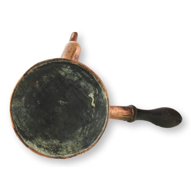 Early 19th-century English copper chocolate pot featuring dovetailed seams—a hallmark of age and early craftsmanship—along...