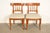An outstanding pair of Regency or Neoclassical style Klismos side chairs or dining chairs By Kindel Furniture USA, Circa...
