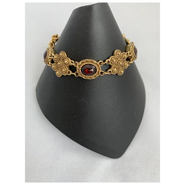 Vintage Bohemian Garnet bracelet. The person I bought this from said her grandmother purchased in the 30s. Gold plated...