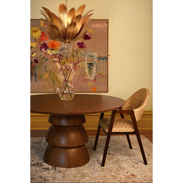 New special order item. Not vintage. The elegant Callum round dining table is crafted from provincial brown oak with a...