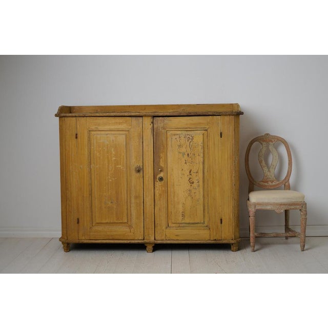 Sideboard from the Swedish gustavian period made in northern Sweden around 1790. This antique sideboard is a genuine...
