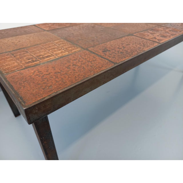 Vintage rectangular coffee table from the 1960s, attributed to Jean Jaffeux, in the spirit of Roger Capron, steel base and...