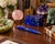 An elegant ballpoint pen crafted from genuine natural lapis lazuli, prized for its extraordinary deep blue color and...