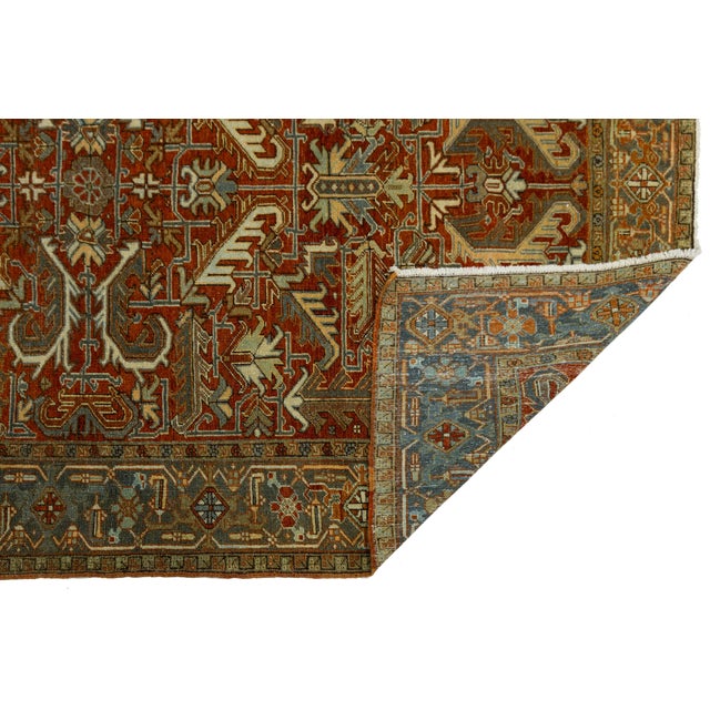 This stunning Antique Persian Heriz rug (often referred to in its finer iterations as a Serapi) features the...