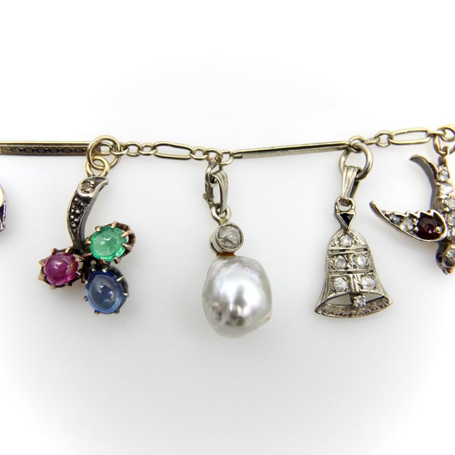 1920s Art Deco 14k Gold and Platinum Diamond and Gem Set Charm Bracelet For Sale In Los Angeles - Image 6 of 12