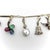 1920s Art Deco 14k Gold and Platinum Diamond and Gem Set Charm Bracelet For Sale In Los Angeles - Image 6 of 12