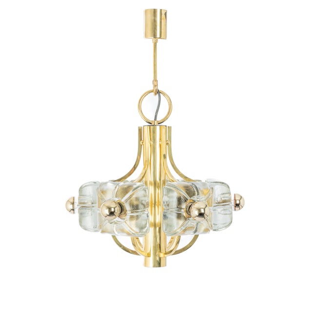 A wonderful large and high-quality gilded chandelier/pendant light fixture by sische, germany, 1970s it is made of a brass...