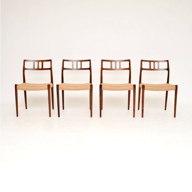 An incredibly stylish and iconic set of four Danish vintage model 79 chairs by Niels Moller. They were originally designed...
