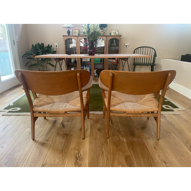 Vintage Pair of Carl Hansen & Son Ch 22 Lounge Chairs by Hans Wegner For Sale - Image 11 of 14