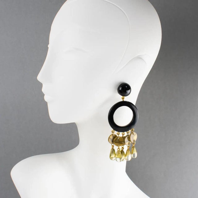 These stunning oversized clip-on earrings by Dominique Denaive Paris boast a sculptural chandelier dangling shape with...
