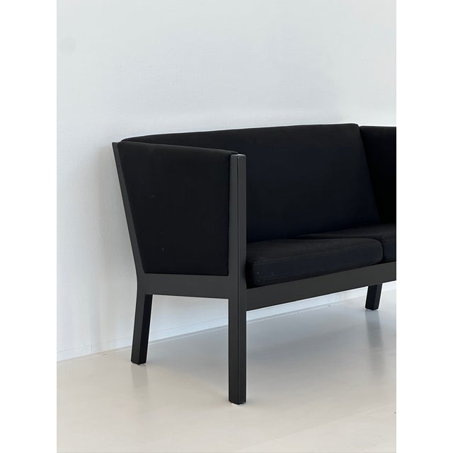 Two-Seater Sofa by Hans J. Wegner for Getama, Denmark, 1980s, in Flawless conditions. Designed 1980 to 1989 This piece has...