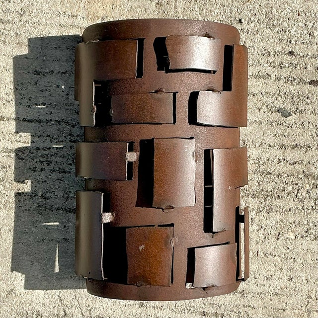 Enhance your decor with the bold elegance of this vintage boho French Brutalist wall sconce cover. Featuring a striking,...