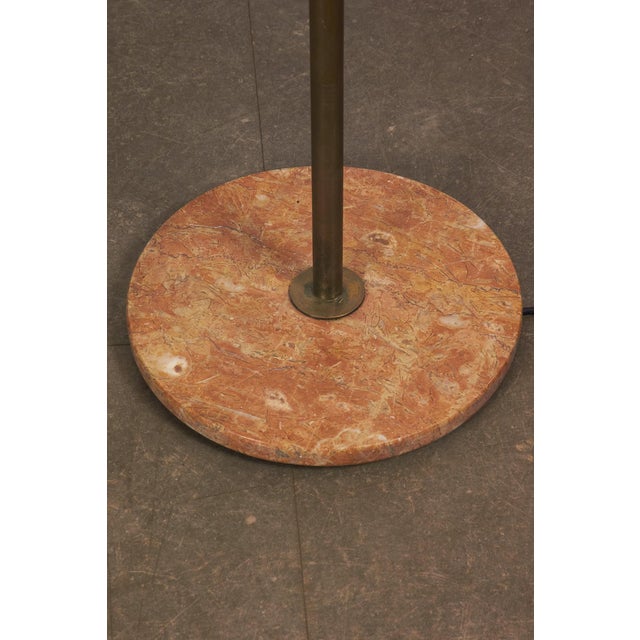 Floor Lamp attributed to Angelo Ostuni for Olouce, 1950s, in Very Good conditions. Designed 1950 to 1959 This piece is...