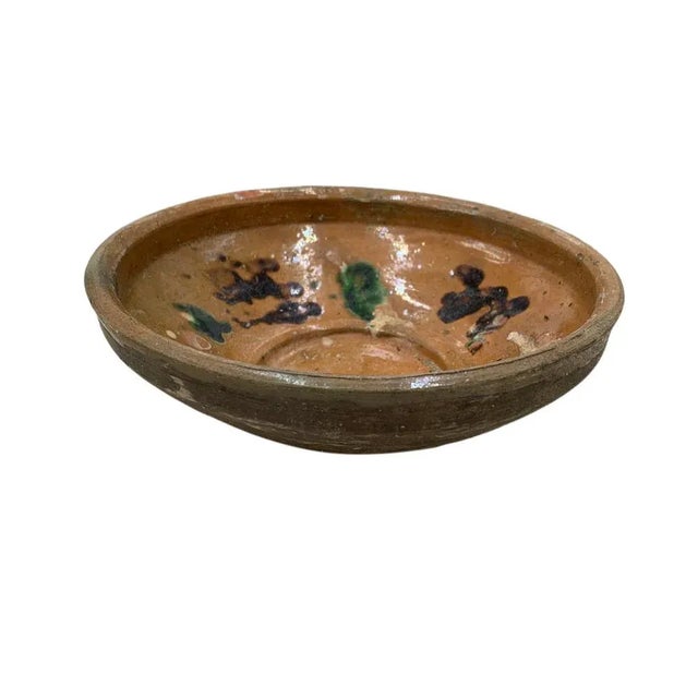 This antique terra cotta decorative bowl from Hungary is a wonderful addition to any Farmhouse decor. The rustic piece...