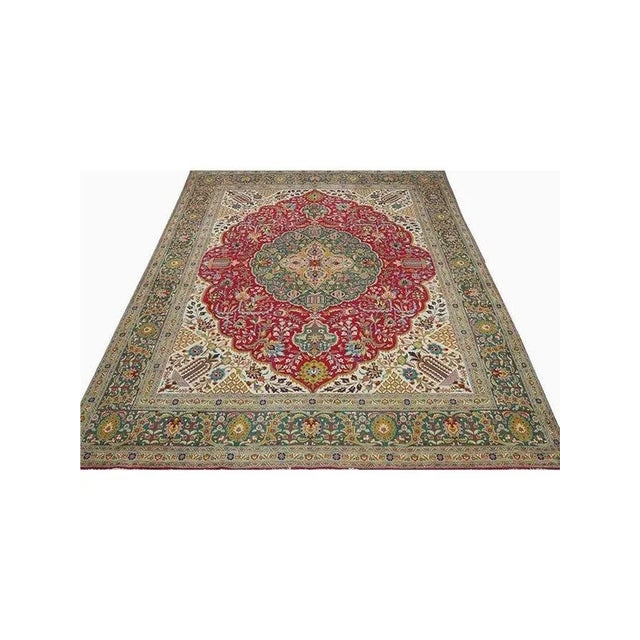 Old Persian Tabriz rug: A seasoned beauty from Tabriz, boasting timeless allure with its refined designs, subtle colors,...