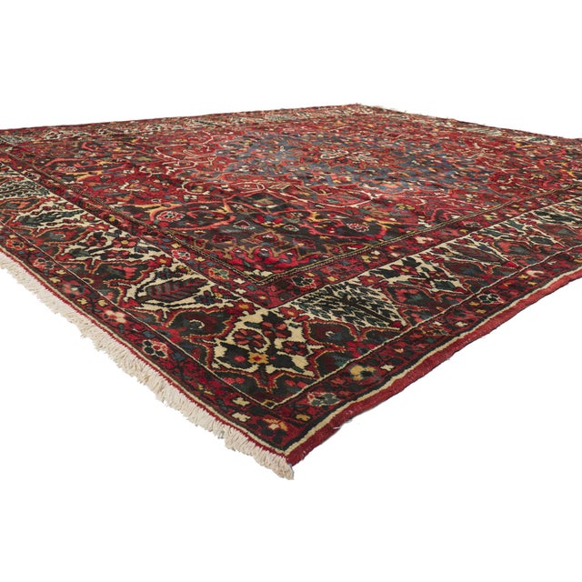 73095 Antique Persian Bakhtiari Rug 10'02 x 11'10. In this masterfully hand-knotted antique Persian Bakhtiari rug, the...
