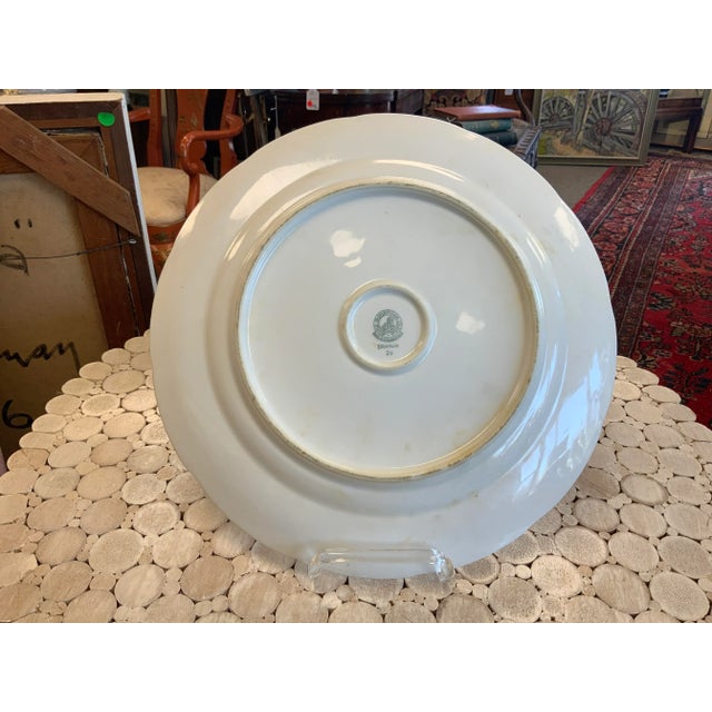 Beautiful and classic Fine Bohemian China Cake Plate. The plate has a molded basket weave border, accented with a gilt...