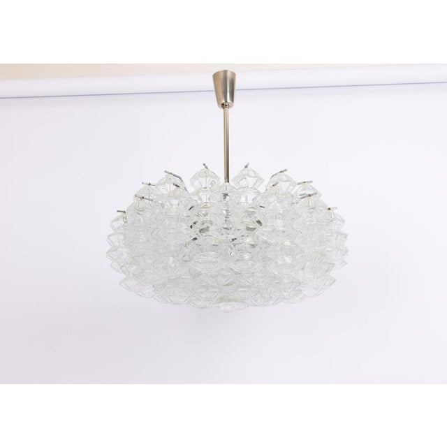 Wonderful rare chandelier with onion shaped glasses. Many hand blown glasses suspended on metal frame best of design from...