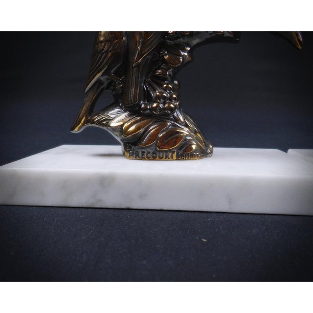 Pair of spelter and marble bird bookends by Frécourt, Art Deco Created through the ingenuity of master French bronze...