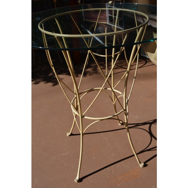 This Bistro set is by Timmerman, NC. Quality furniture that is custom made. Swivel stools, seats 31" high & arms 21"...