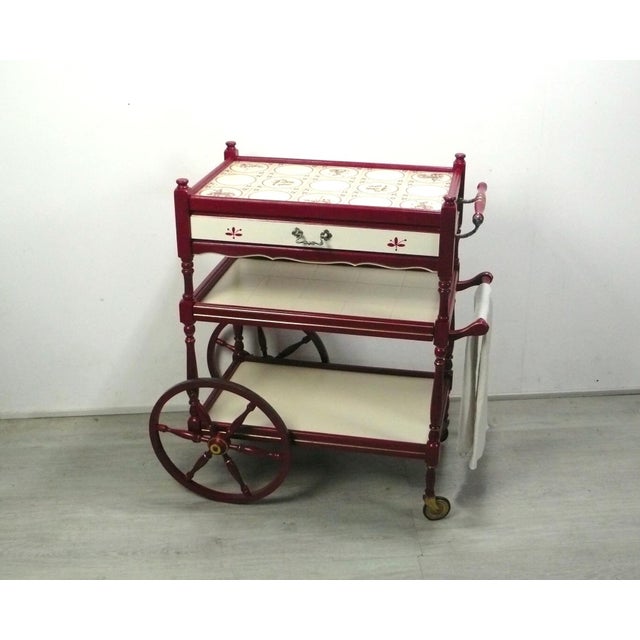Vintage serving cart, coffee/bar cart, sideboard, with 3 shelves and drawer in wood, shabby ruby ​​red and cream. this is...