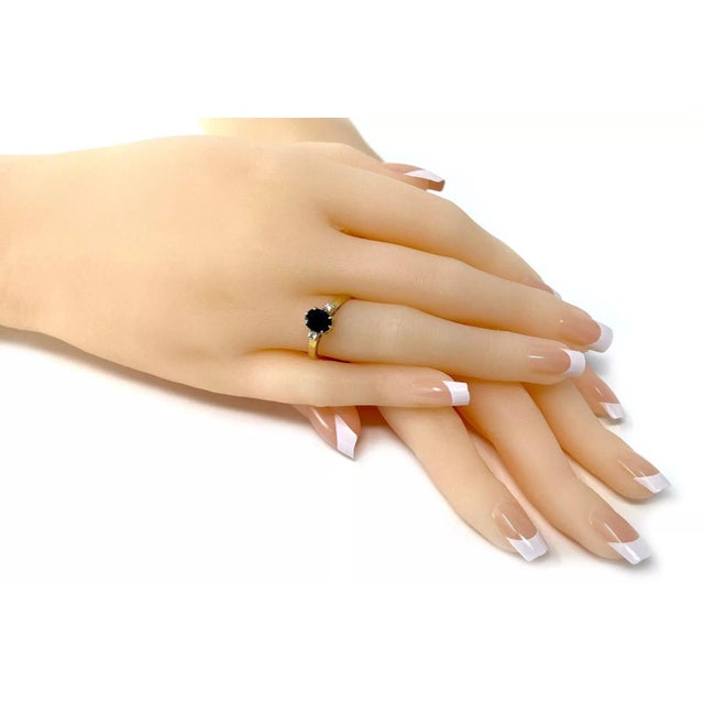 This beautiful authentic cocktail ring is from Mikimoto, crafted from 18k yellow gold with a polished finish featuring a...