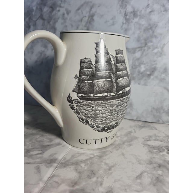 This charming black on cream transferware pitcher features images of the classic ship, Cutty Sark. Made for Cutty Sark...