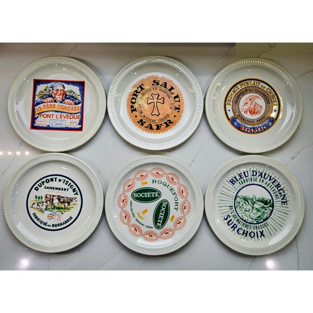 Bring authentic French bistro charm to the table with this delightful set of six vintage “Fromages de France” cheese...