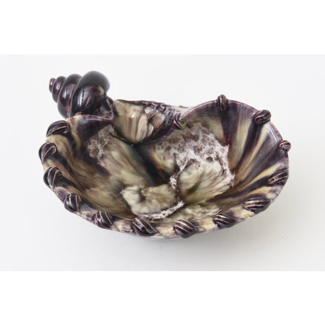 This lovely vintage Italian hallmarked mid century modern glazed ceramic bowl is in the shape of a coiled snail. It has...