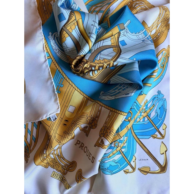 Hermès Proues Anglais Hermes Prows Silk Scarf This scarf is inspired by the prows of galleons and caravels of the past. A...