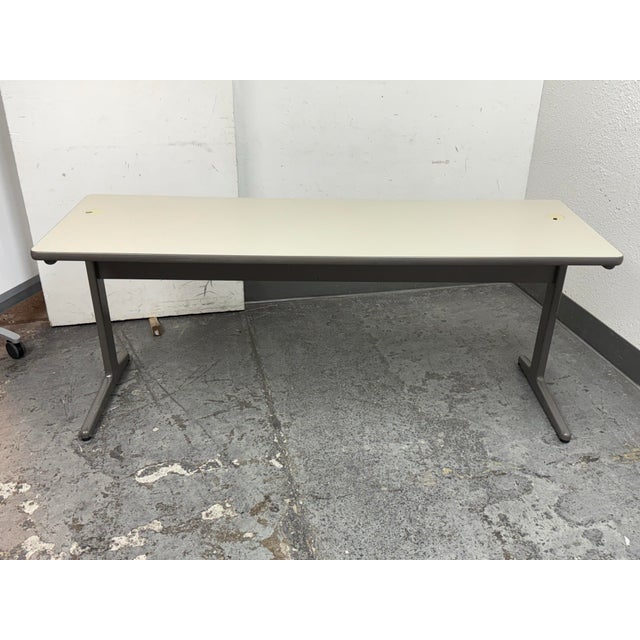 Design Plus Gallery presents a Mid Century Vintage Writing Desk. The look is similar to the writing/office desk designed...