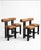 Set of 4 custom counter stools. Upholstered in high performance faux leather. Wood finish in Noir with blackened silver...